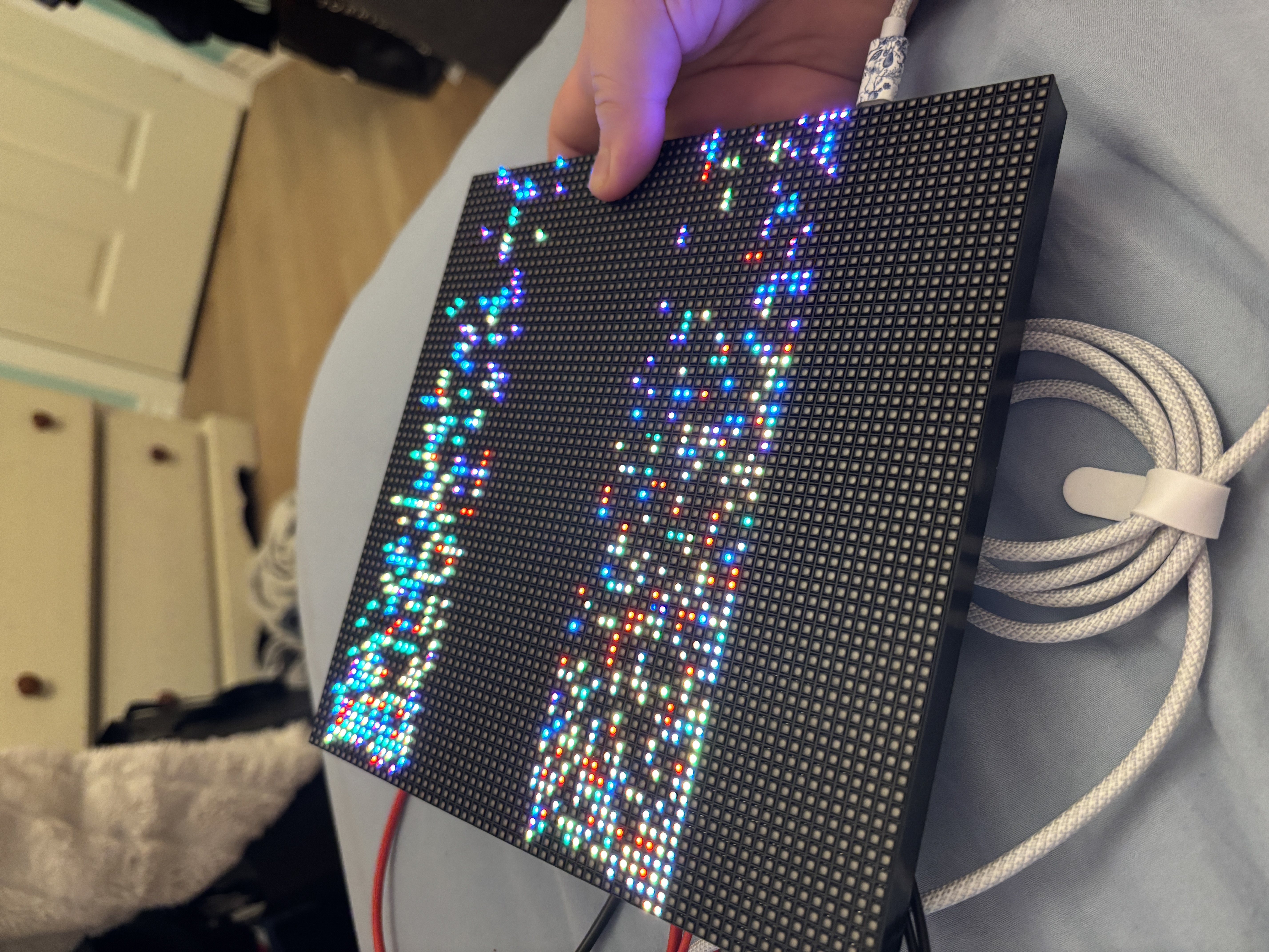 Tested a already made code to make sure that the LED board was working this is where i figured out i did not have enough amp on my block but if i hold my finger over a certin part of the matrix portal it will show over the full board for a short period of time